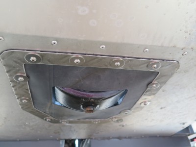 Underside view showing the rubber cover to the hole in the floor.  Made from 1.5mm ally checker plate (rips nicely onto the rubber sheet)